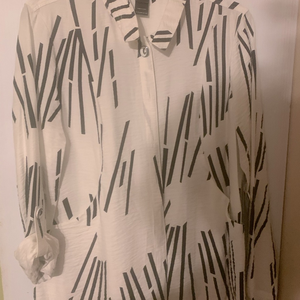 - White with black flare button down blouse